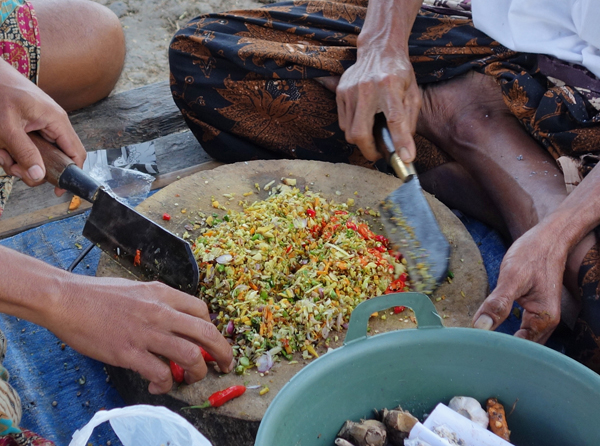 Men preparing lawar